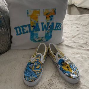 University of Delaware pillow and sneakers